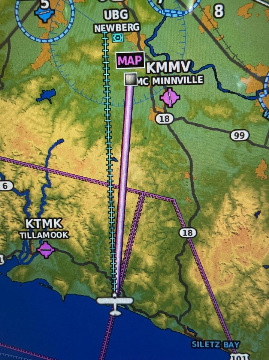 A different sense of distance — the coast and valley on the cockpit map.